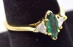 Mesmerizing 18K Yellow Gold Approx. 0.47CTS Emerald and Approx. 0.26CTW Diamond Ring