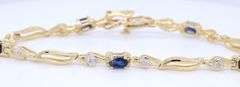 14kt Yellow gold 2.50ctw sapphire and diamond bracelet