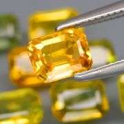 Full fire! 5.02ct top golden green Sapphire set