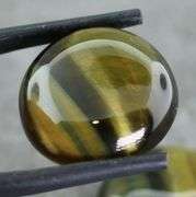 Full body shimmer! 30.51ct Golden Tiger Eye cabochon pair