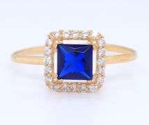 Set of 18kt yellow gold blue synthetic sapphire and CZ ring, earrings and necklace