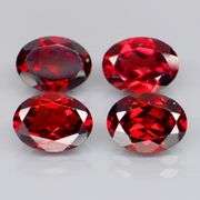 Amazing 5.88ct oval cut cherry red Garnet set