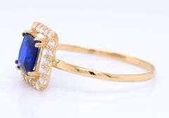 Set of 18kt yellow gold blue synthetic sapphire and CZ ring, earrings and necklace