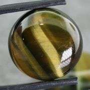 Full body shimmer! 30.51ct Golden Tiger Eye cabochon pair