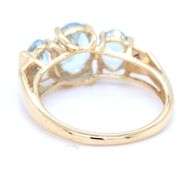 14kt Yellow gold 2ctw oval aquamarine and diamond accent 3 stone ring