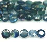 Heated only! 7.74ct greenish blue sapphire set
