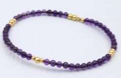 Lot of 2 amethyst beaded bracelets with gold accents