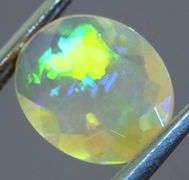Captivating 1.62ct fully faceted fairy fire jelly Opal