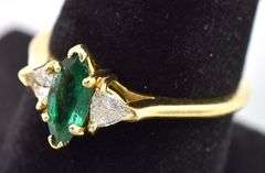 Mesmerizing 18K Yellow Gold Approx. 0.47CTS Emerald and Approx. 0.26CTW Diamond Ring