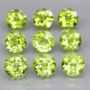 Fantastic 4.90ct 5mm round brilliant cut Peridot set