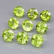 Fantastic 4.90ct 5mm round brilliant cut Peridot set