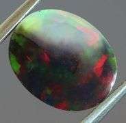Fiery flashing 1.92ct Ethiopian bi-color Opal