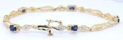 14kt Yellow gold 2.50ctw sapphire and diamond bracelet