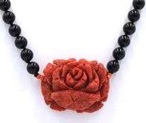 Coral flower pendant on black onyx beads necklace