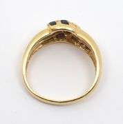 Attractive Channel Set Sapphire Ring