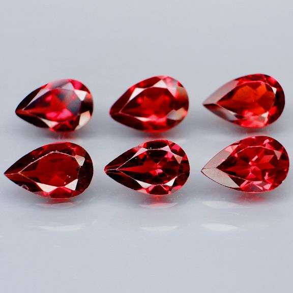 Top color 6.10ct cherry red Mozambique Garnet set