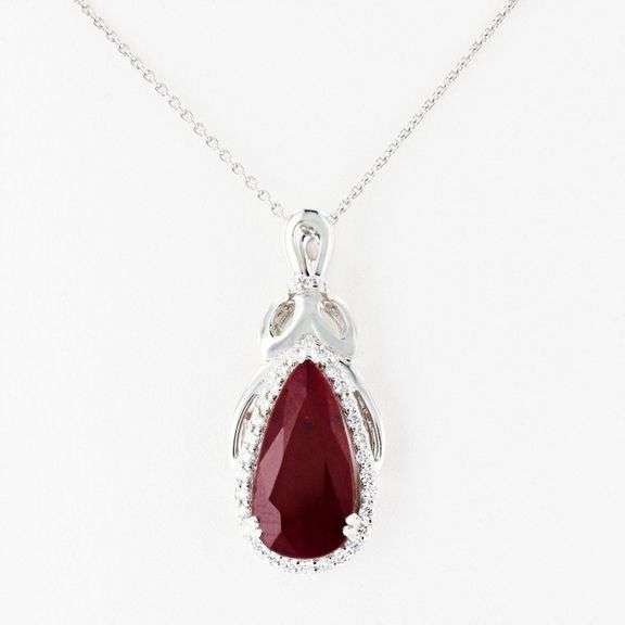 PLATINUM RUBY AND DIAMOND PENDANT 4.06 C.T.W.