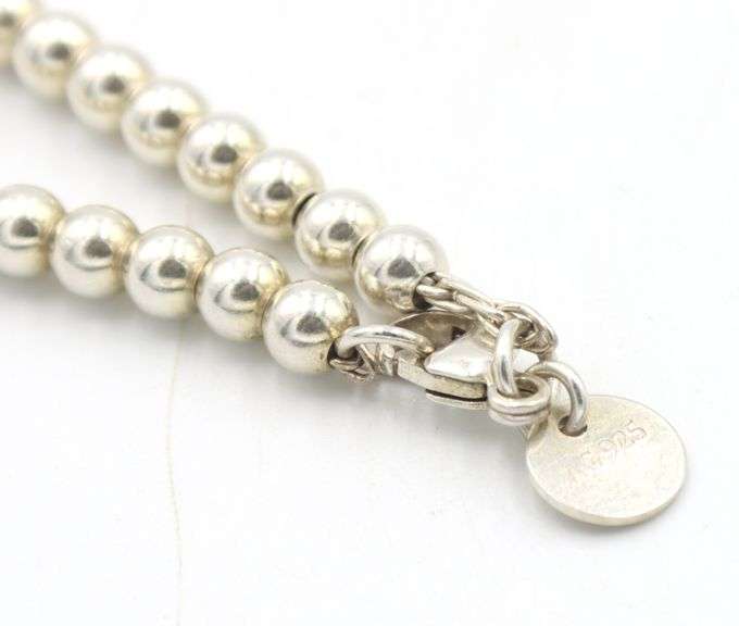 925 Sterling silver Tiffany & Co bracelet with blue heart shaped charm
