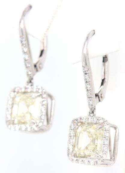 Elegant Platinum and 18k Gold Diamond Dangle Earrings