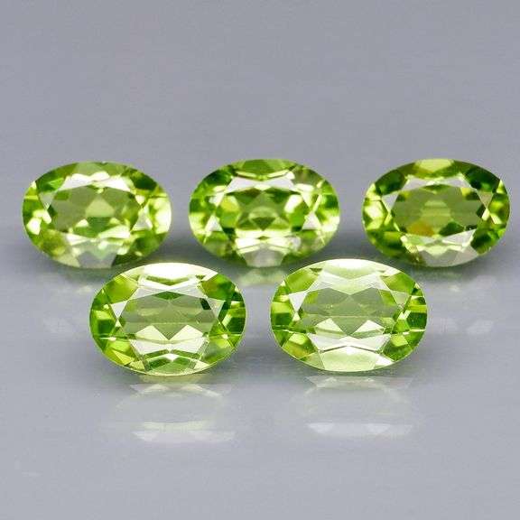 Dazzling 4.28ct untreated apple green Peridot set