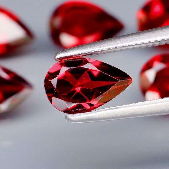 Top color 6.10ct cherry red Mozambique Garnet set