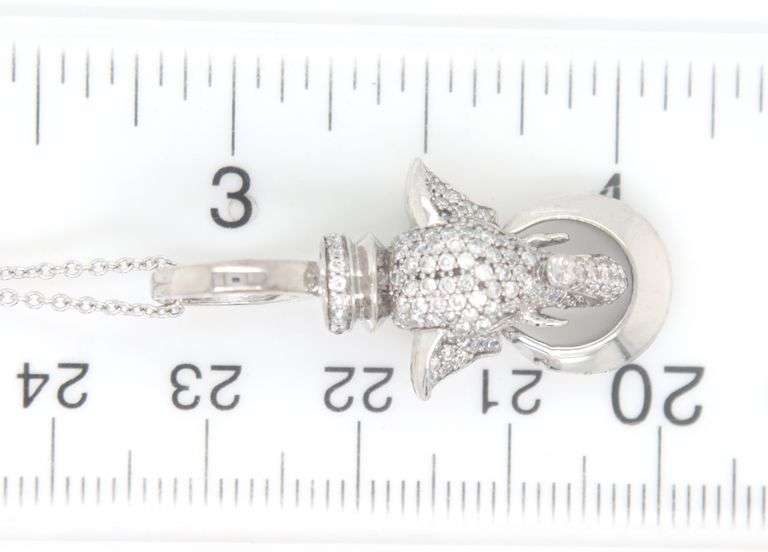 14kt White gold 1ctw diamond and ruby eye elephant head pendant on chain