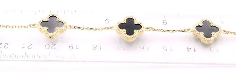 Lovely 14K Yellow Gold 5 Motif Black Onyx Bracelet