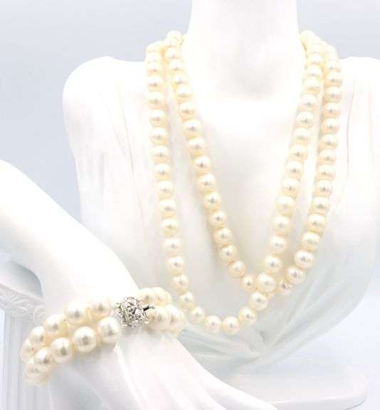Set of white freshwater pearl double strand necklace and matching bracelet