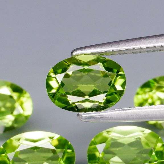 Dazzling 4.28ct untreated apple green Peridot set