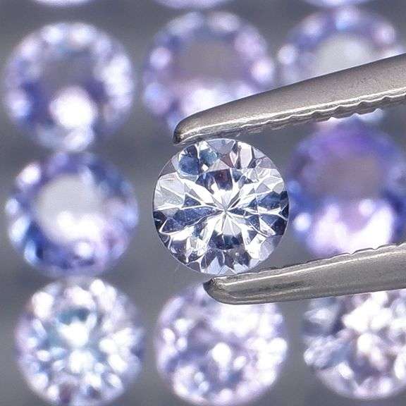 Non stop flashing 3.09ct diamond cut Tanzanite set