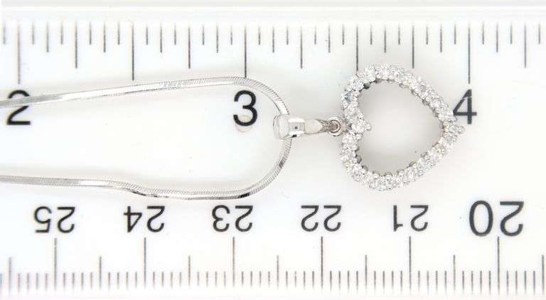 14kt White gold diamond heart shaped pendant on chain