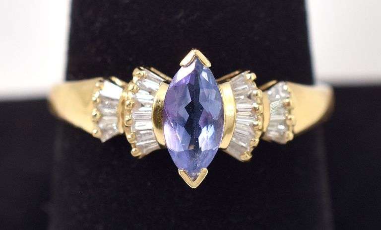 A Ravishing Tanzanite and Diamond Ring in 14K Yellow Gold