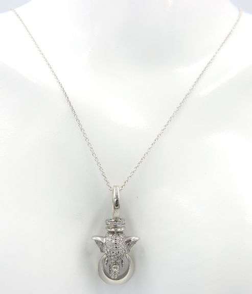14kt White gold 1ctw diamond and ruby eye elephant head pendant on chain