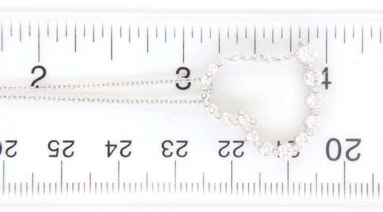 14kt White gold 1ctw diamond graduated open heart pendant on chain