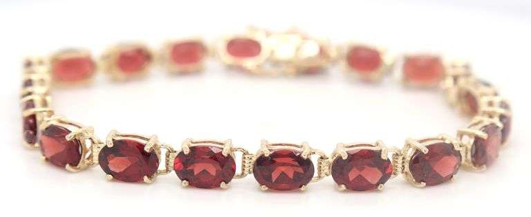 14kt Yellow gold oval garnet tennis bracelet
