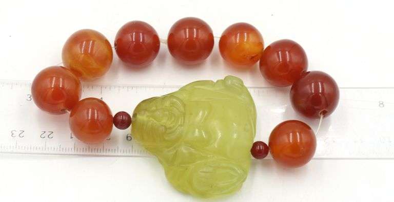 Chunky Amber and Jade Buddha bracelet
