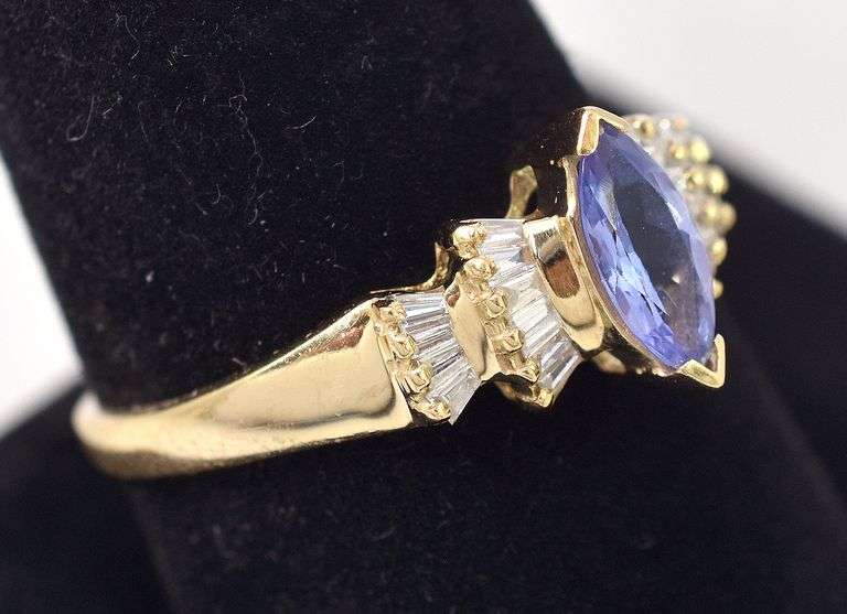 A Ravishing Tanzanite and Diamond Ring in 14K Yellow Gold
