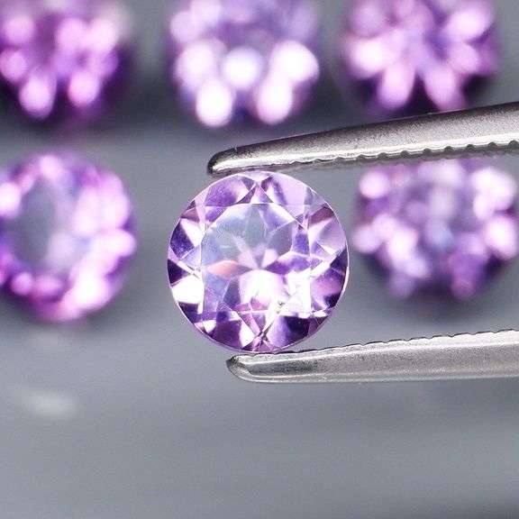 Glittering 7.41ct round cut Bolivian Amethyst set