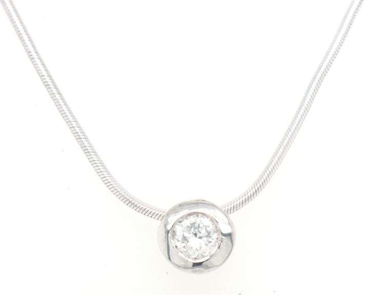 14kt White gold 0.25ctw bezel set diamond pendant on chain