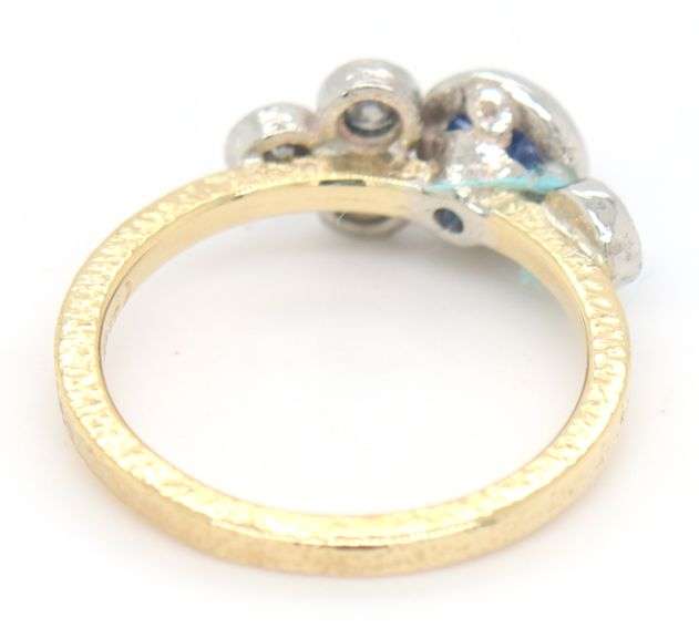 18kt Yellow gold bezel set sapphire and diamond ring