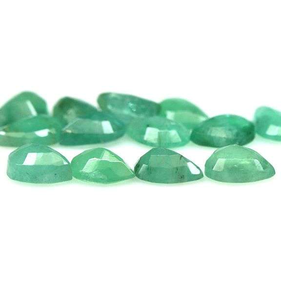 Pear cut 8.08ct Zambian Emerald set