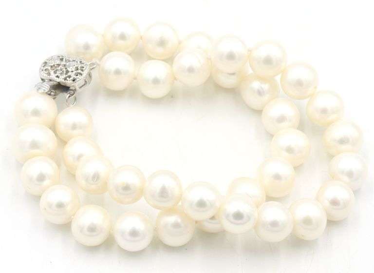 Set of white freshwater pearl double strand necklace and matching bracelet