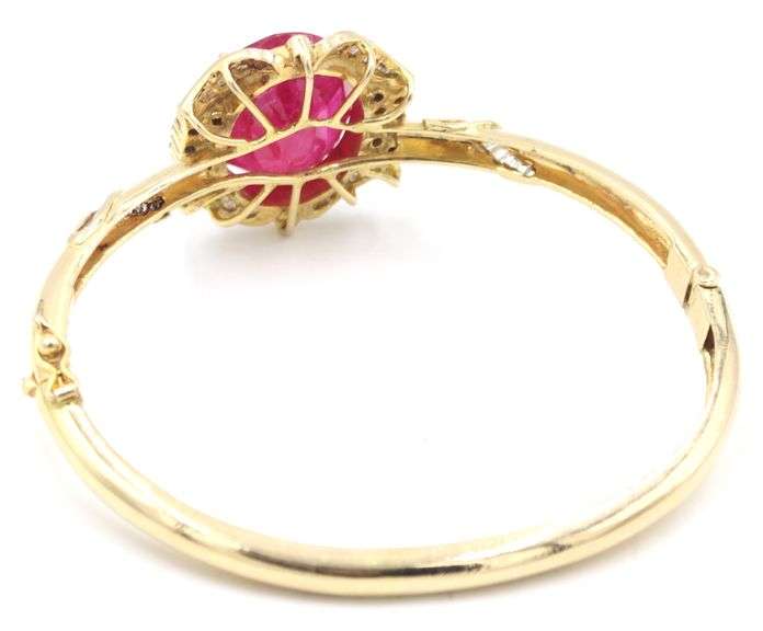 collector's item! 14K Yellow Gold W/ 15.75CTS Oval Emerald-Cut Natural Ruby & 1.25CTW Round Brillian