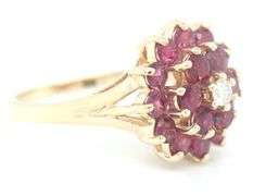 14kt Yellow gold ruby and diamond cluster ring