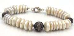 Pearl beaded disc bracelet in costume jewelry