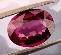 Glittering 1.38ct untreated top violet pink Rhodolite Garnet