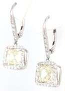 Elegant Platinum and 18k Gold Diamond Dangle Earrings