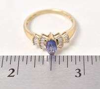 A Ravishing Tanzanite and Diamond Ring in 14K Yellow Gold