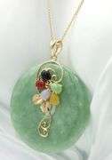 14kt Yellow gold Jade circle pendant with multi color Jade flower