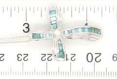 14kt White gold IR Teal and white diamond cross pendant on chain